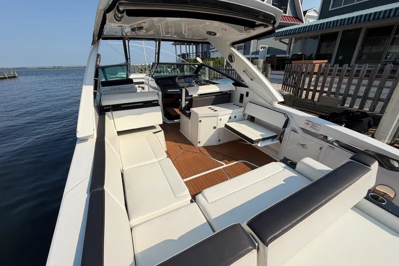 Slide: The Image of Luxurious 2017 Monterey 378SE Super Express boat with spacious seating and sleek design. - 8