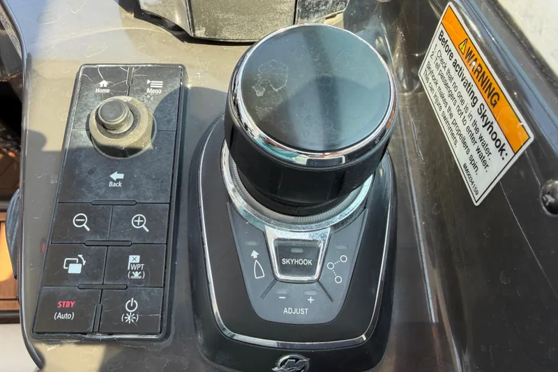 Slide: The Image of Control panel of a 2017 Monterey 378SE Super Express boat with Skyhook feature. - 22