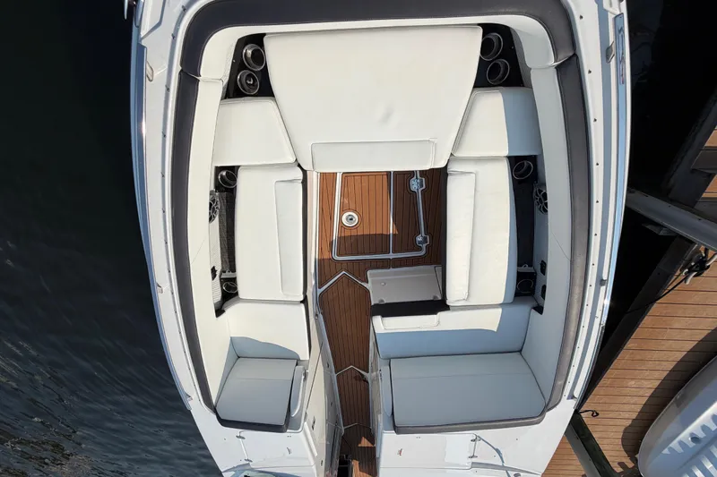 Slide: The Image of Overhead view of 2017 Monterey 378SE Super Express boat interior with white seating. - 28