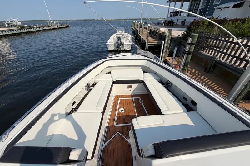 Slide: The Image of 2017 Monterey 378SE Super Express boat with spacious seating and elegant wood flooring. - 25