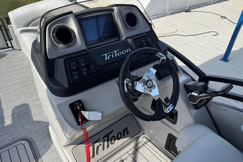 Slide: The Image of Cockpit of 2026 JC Neptoon Sport 23TT DSL with steering wheel and control panel. - 15