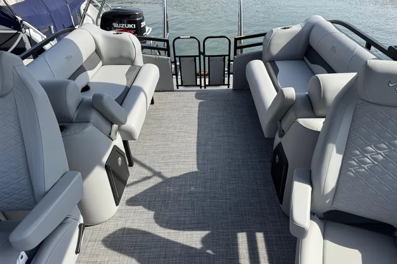 Slide: The Image of Luxurious interior of 2026 JC Neptoon Sport 23TT DSL pontoon boat with plush seating. - 16