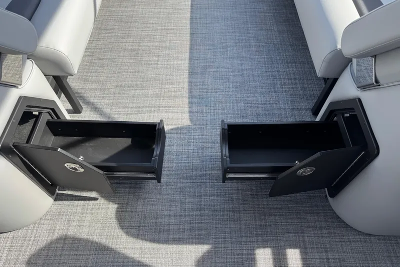 Slide: The Image of Open storage compartments on 2026 JC Neptoon Sport 23TT DSL boat interior. - 17