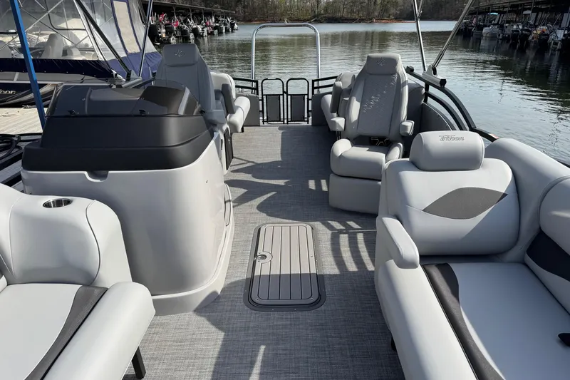 Slide: The Image of 2026 JC Neptoon Sport 23TT DSL pontoon boat interior with luxurious seating and modern design. - 7