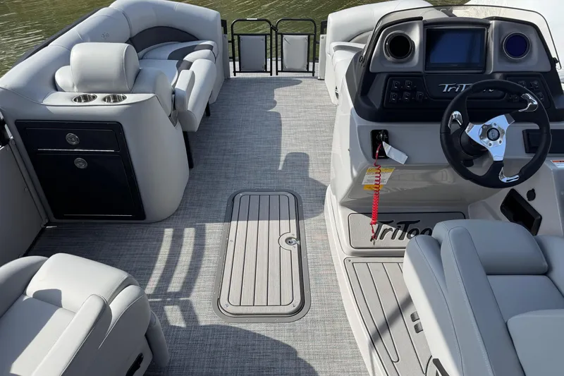 Slide: The Image of Interior of 2026 JC Neptoon Sport 23TT DSL pontoon boat with modern seating and helm. - 8