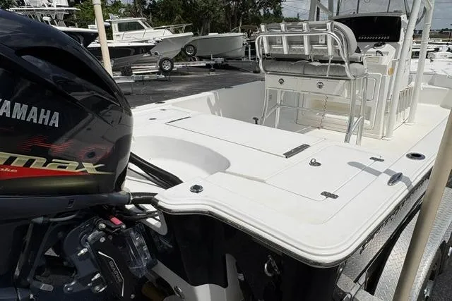 Slide: The Image of 2016 Sportsman Tournament 234 Bay Boat with Yamaha engine, docked in a marina. - 10
