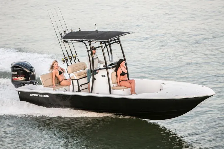 Slide: The Image of Manufacturer Provided Image: 2016 Sportsman Tournament 234 Bay Boat cruising with passengers on a sunny day. - 22