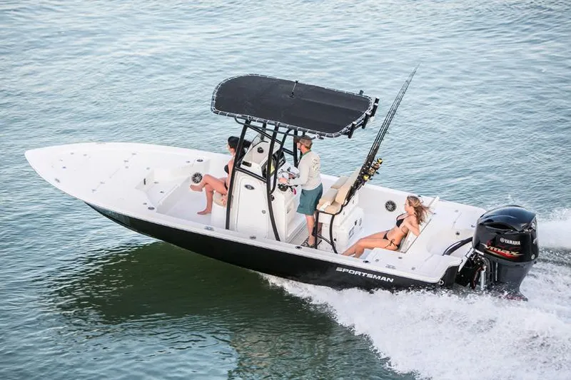 Slide: The Image of Manufacturer Provided Image: 2016 Sportsman Tournament 234 Bay Boat cruising on water with passengers. - 23