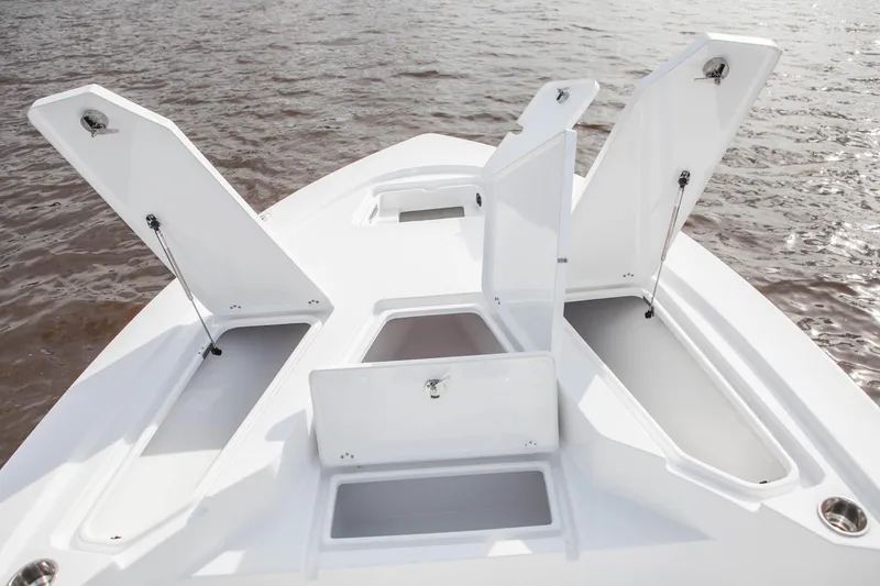 Slide: The Image of Manufacturer Provided Image: 2016 Sportsman Tournament 234 Bay Boat storage compartments open on deck. - 26