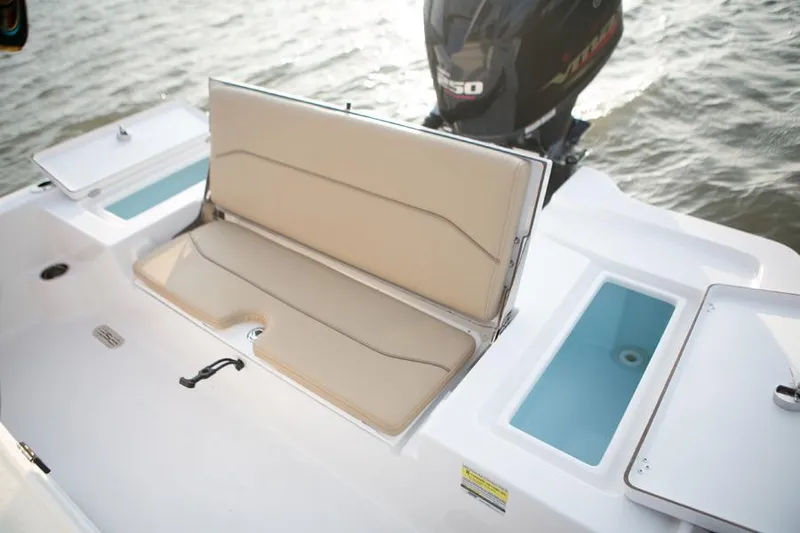 Slide: The Image of Manufacturer Provided Image: 2016 Sportsman Tournament 234 Bay Boat with open seating and storage compartments. - 28