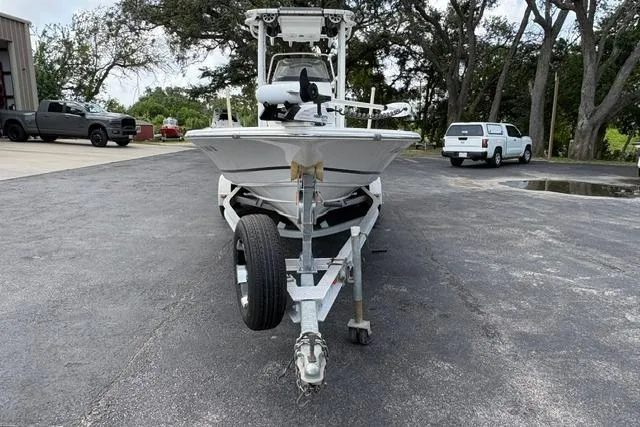 Slide: The Image of 2016 Sportsman Tournament 234 Bay Boat on trailer in parking lot. - 3