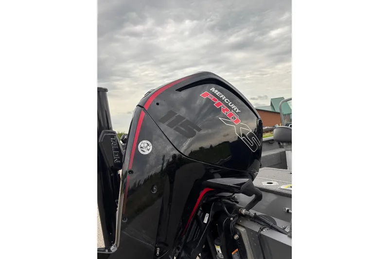 Slide: The Image of 2018 Lund 1775 Impact XS with Mercury Pro XS engine under cloudy sky. - 4