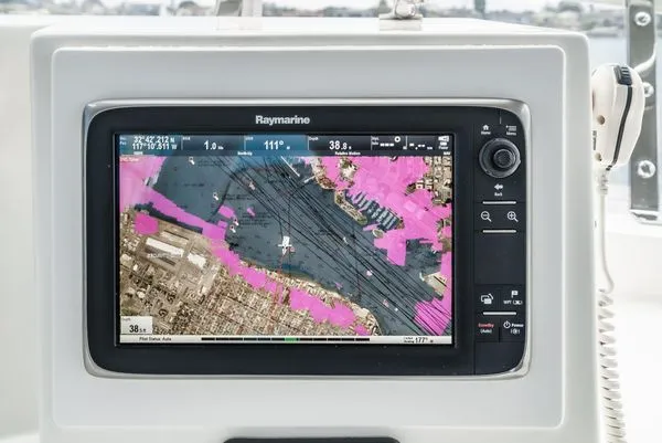 Slide: The Image of Raymarine navigation system on a boat with a map displayed on the screen. - 19