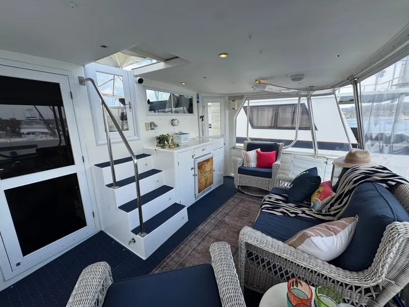 Slide: The Image of Interior of the 2002 Jefferson Rivanna 50 Sundeck MY with comfortable seating and stairs. - 28