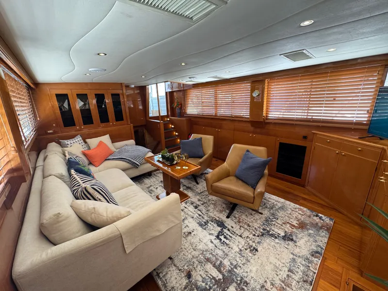 Slide: The Image of Interior of the 2002 Jefferson Rivanna 50 Sundeck MY with cozy living area and wooden furnishings. - 33