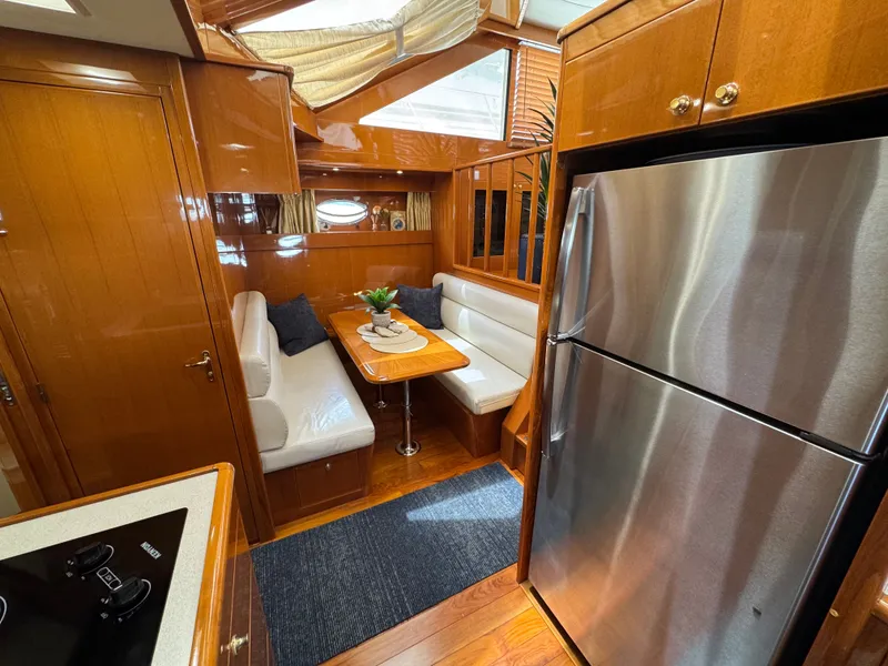 Slide: The Image of Interior of the 2002 Jefferson Rivanna 50 Sundeck MY with dining area and kitchen. - 40