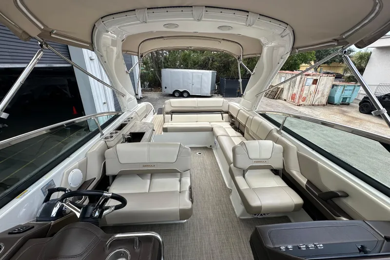 Slide: The Image of 2018 Formula 290 Bowrider interior with spacious seating and modern design. - 13