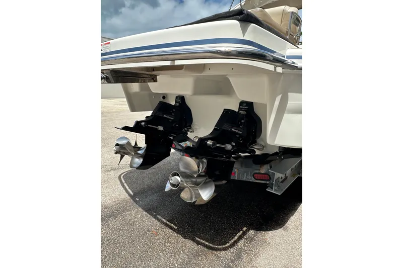 Slide: The Image of 2018 Formula 290 Bowrider boat with dual propellers, rear view. - 6