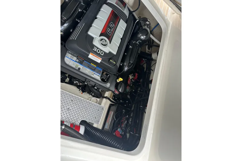 Slide: The Image of Engine compartment of a 2018 Formula 290 Bowrider, featuring a 6.2L 300 horsepower engine. - 9