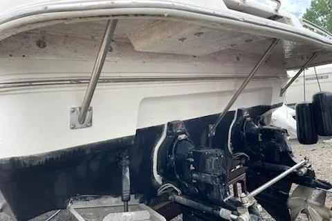 Slide: The Image of 2002 Cruisers Yachts 3372 Express boat stern and outdrive components. - 4