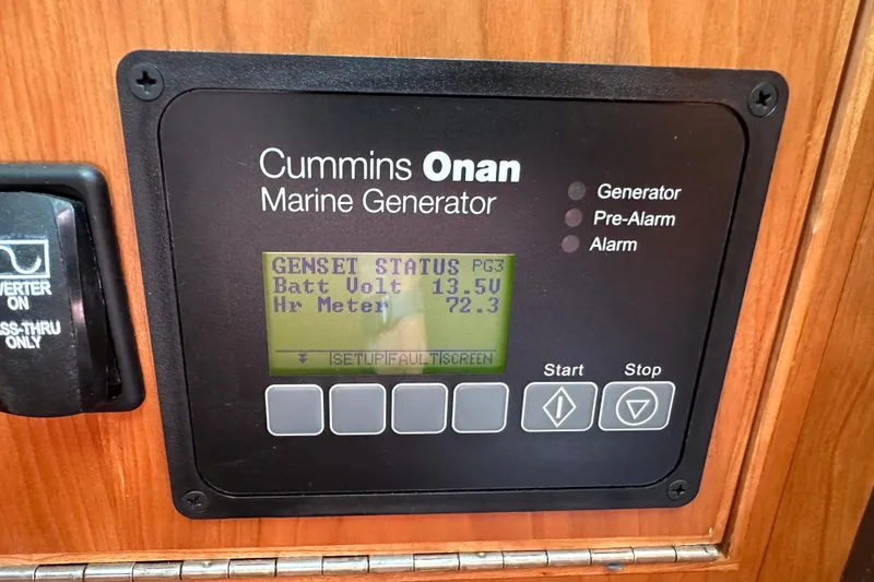 Slide: The Image of Cummins Onan marine generator display on 2025 Sabre 48 Salon Express yacht. - 100