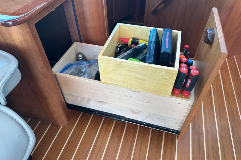 Slide: The Image of Drawer with tools and supplies on a 2025 Sabre 48 Salon Express yacht. - 18