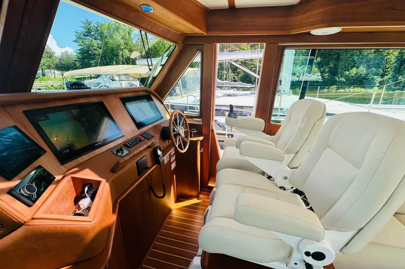 Slide: The Image of Luxurious interior of 2025 Sabre 48 Salon Express yacht with modern navigation equipment. - 29