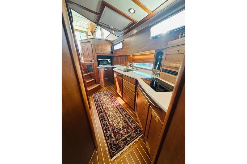 Slide: The Image of Luxurious interior of 2025 Sabre 48 Salon Express yacht with elegant wood finishes. - 42