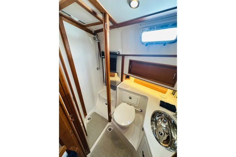 Slide: The Image of Luxurious bathroom interior of 2025 Sabre 48 Salon Express yacht, featuring modern fixtures. - 57