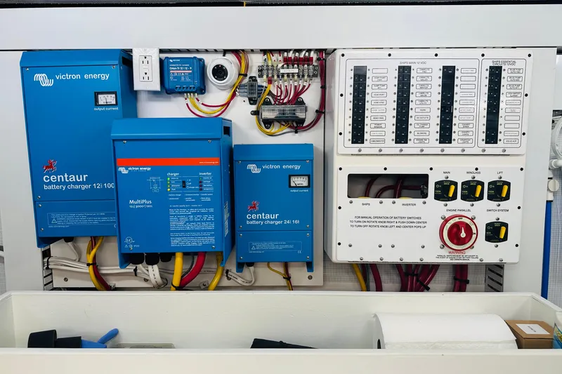Slide: The Image of Electrical panel of 2025 Sabre 48 Salon Express with Victron Energy components. - 74