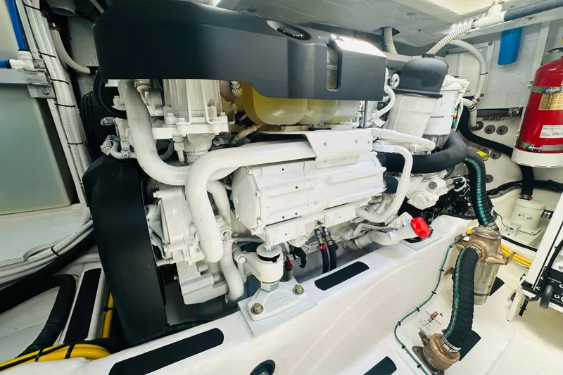 Slide: The Image of Engine room of 2025 Sabre 48 Salon Express, showcasing advanced marine engineering. - 78