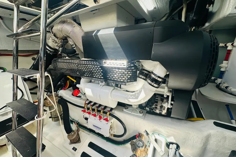 Slide: The Image of Engine room of 2025 Sabre 48 Salon Express, showcasing advanced mechanical components. - 79