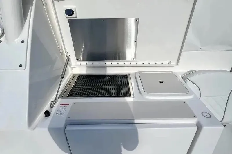 Slide: The Image of 2023 Pursuit OS 355 Offshore boat grill and prep station, featuring sleek design and functionality. - 7
