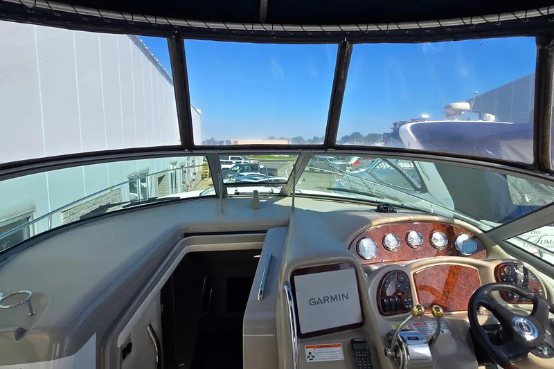 Slide: The Image of Cockpit view of 2007 Sea Ray 340 Sundancer with Garmin navigation system. - 13