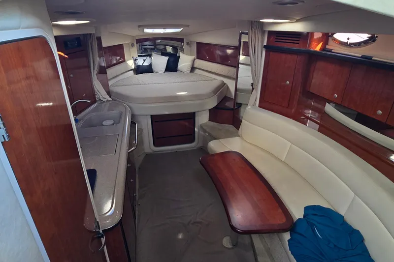 Slide: The Image of Luxurious interior of a 2007 Sea Ray 340 Sundancer yacht with elegant wood finishes. - 14