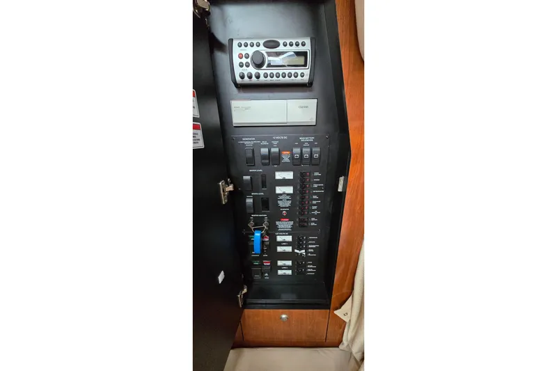 Slide: The Image of Electrical control panel of 2007 Sea Ray 340 Sundancer boat interior. - 24