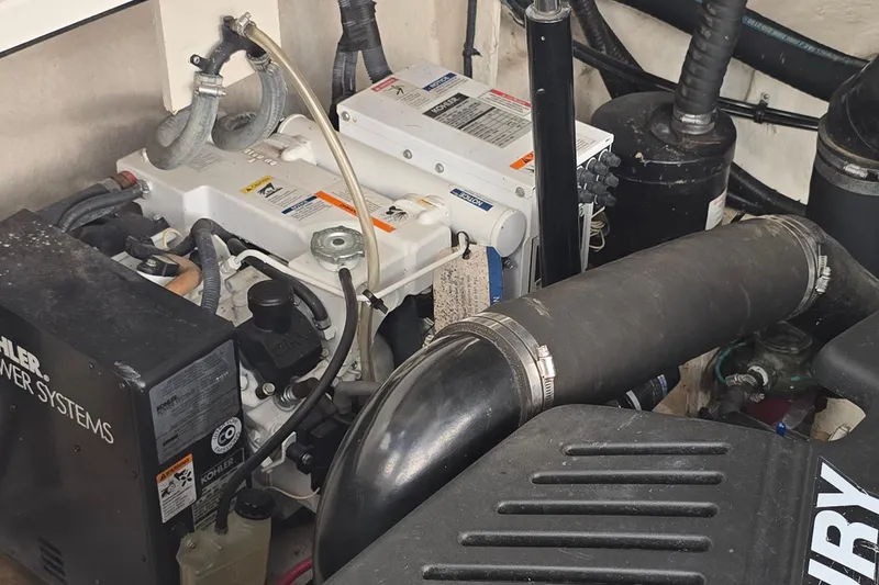 Slide: The Image of Engine compartment of a 2007 Sea Ray 340 Sundancer with Kohler power systems. - 28
