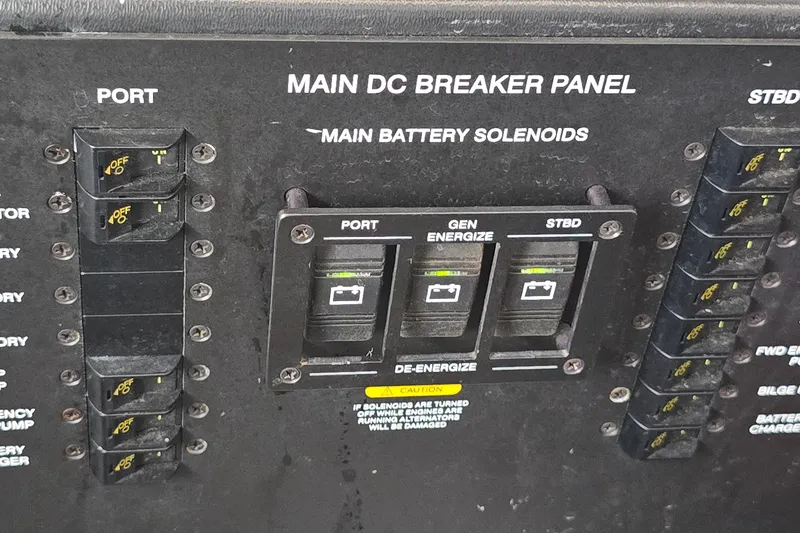 Slide: The Image of Main DC breaker panel on 2007 Sea Ray 340 Sundancer boat, featuring battery solenoids. - 30