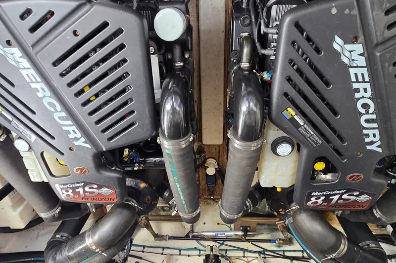 Slide: The Image of Engine compartment of a 2007 Sea Ray 340 Sundancer with twin MerCruiser 8.1S Horizon engines. - 32