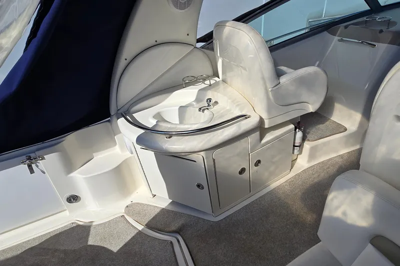 Slide: The Image of Interior of 2007 Sea Ray 340 Sundancer boat with sink and seating area. - 6