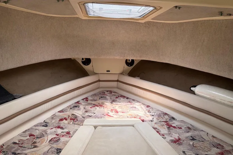 Slide: The Image of Interior cabin of 1999 Grady-White Marlin 300 boat with patterned upholstery. - 9