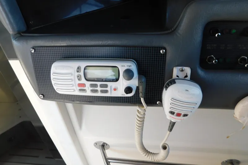 Slide: The Image of VHF radio system on 1990 Sea Ray 350 Express Cruiser dashboard. - 15