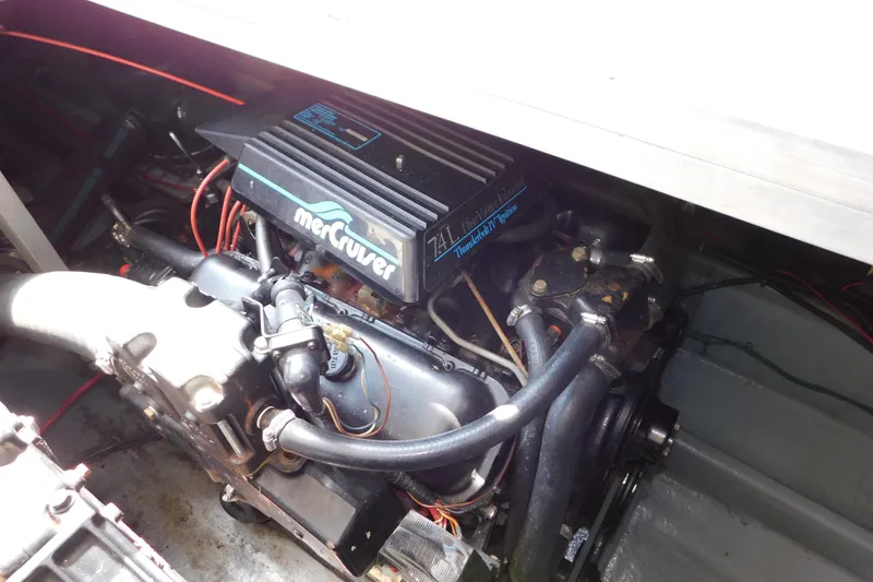 Slide: The Image of Engine compartment of a 1990 Sea Ray 350 Express Cruiser with MerCruiser engine. - 66