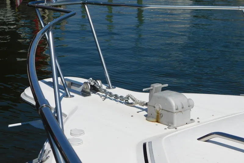 Slide: The Image of Bow of 1990 Sea Ray 350 Express Cruiser with anchor chain and winch. - 4
