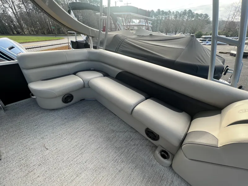 Slide: The Image of The image shows the seating area of a 2020 Premier 240 SunSpree Water Slide boat. - 11