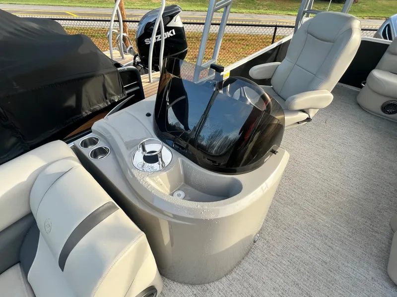 Slide: The Image of The image shows the cockpit of a 2020 Premier 240 SunSpree Water Slide boat with gray seating. - 7