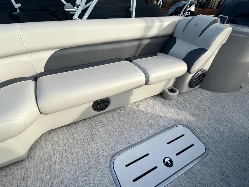 Slide: The Image of Interior view of a 2020 Premier 240 SunSpree Water Slide boat with gray seating. - 6