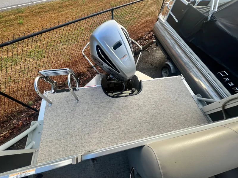 Slide: The Image of The image shows the rear of a 2020 Premier 240 SunSpree with a water slide. - 13