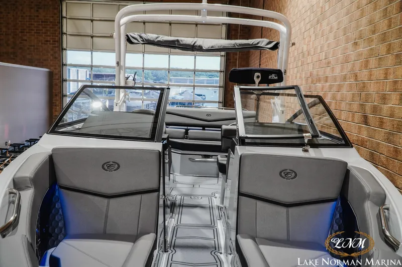 Slide: The Image of 2026 Cobalt R4 Surf boat interior with sleek design at Lake Norman Marina. - 8