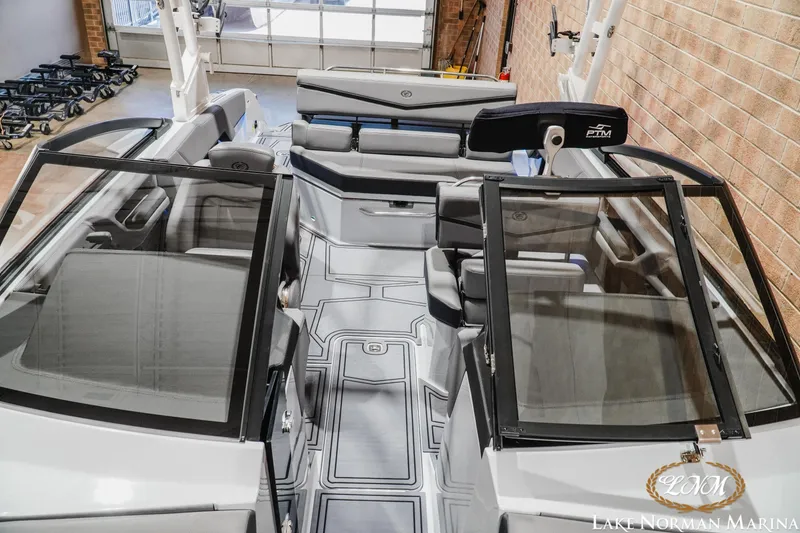 Slide: The Image of 2026 Cobalt R4 Surf boat interior with sleek seating and modern design at Lake Norman Marina. - 18